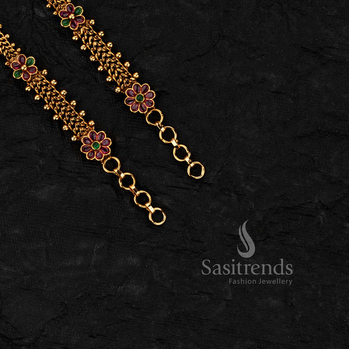 South indian style ear chains with floral patterns and layered chain structure crafted in matte gold plated finish for festive wear