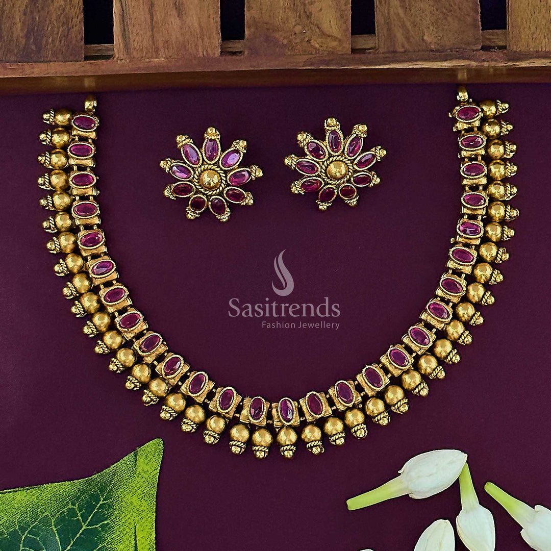 Charming ruby stone bridal jewellery set crafted in temple matte gold polish with elegant AD highlights and ceremonial flair perfect for a graceful wedding look – Sasitrends