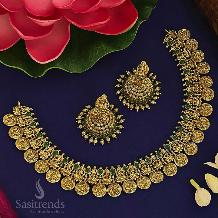 Traditional green coin temple jewellery set with divine Lakshmi and peacock detailing, folk elegance and pious charm, ideal for ethnic occasions and devotional wear by Sasitrends