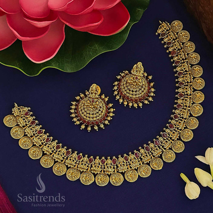 Temple inspired matte ruby gold jewellery set with divine Lakshmi and majestic peacock styling, embodying royal elegance and traditional ethnic treasures by Sasitrends