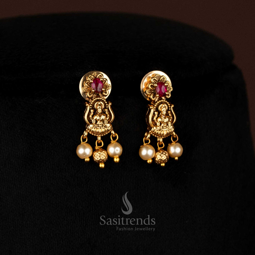 Temple matte gold Goddess Lakshmi necklace with earrings and pearls for wedding and festive wear Sasitrends