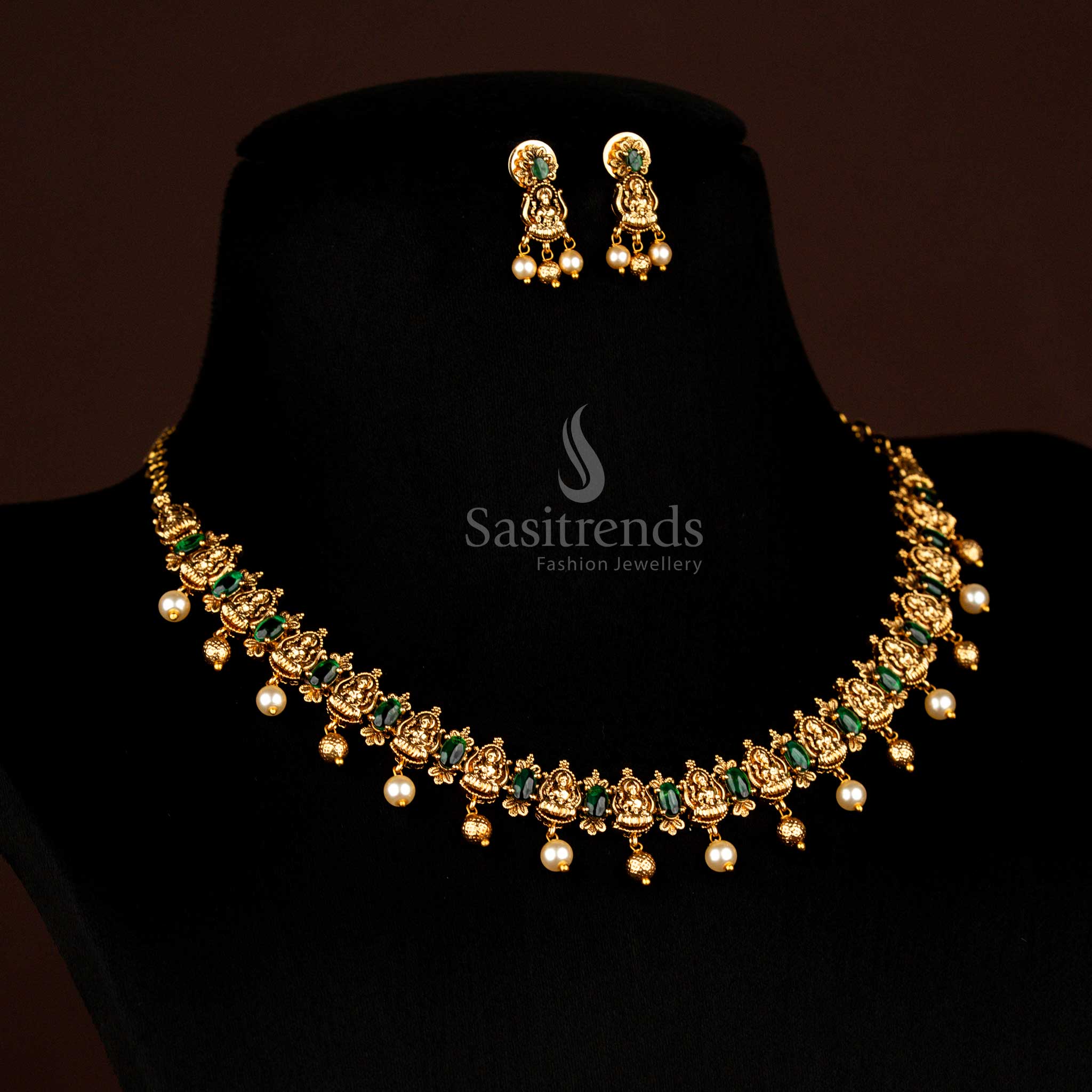 Traditional matte gold plated Goddess Lakshmi necklace with earrings and pearl drops festive wear Sasitrends
