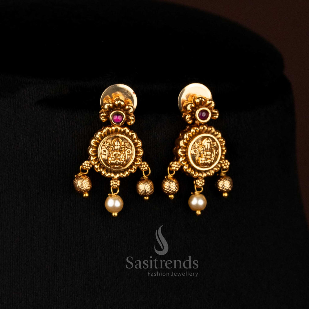 Luxurious Temple Jewellery Necklace with Leaf Fringes, AD Stones, Pearls, and Lakshmi Motifs for Weddings by Sasitrends