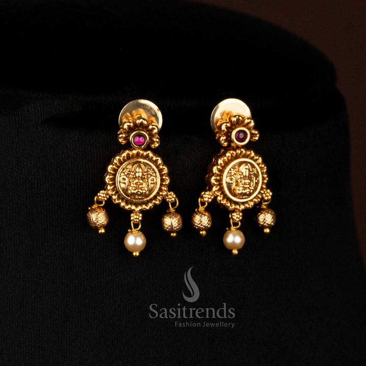 Luxurious Temple Jewellery Necklace with Leaf Fringes, AD Stones, Pearls, and Lakshmi Motifs for Weddings by Sasitrends