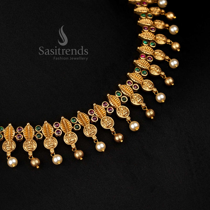 Luxurious Temple Jewellery Necklace with Leaf Fringes, AD Stones, Pearls, and Lakshmi Motifs for Weddings by Sasitrends