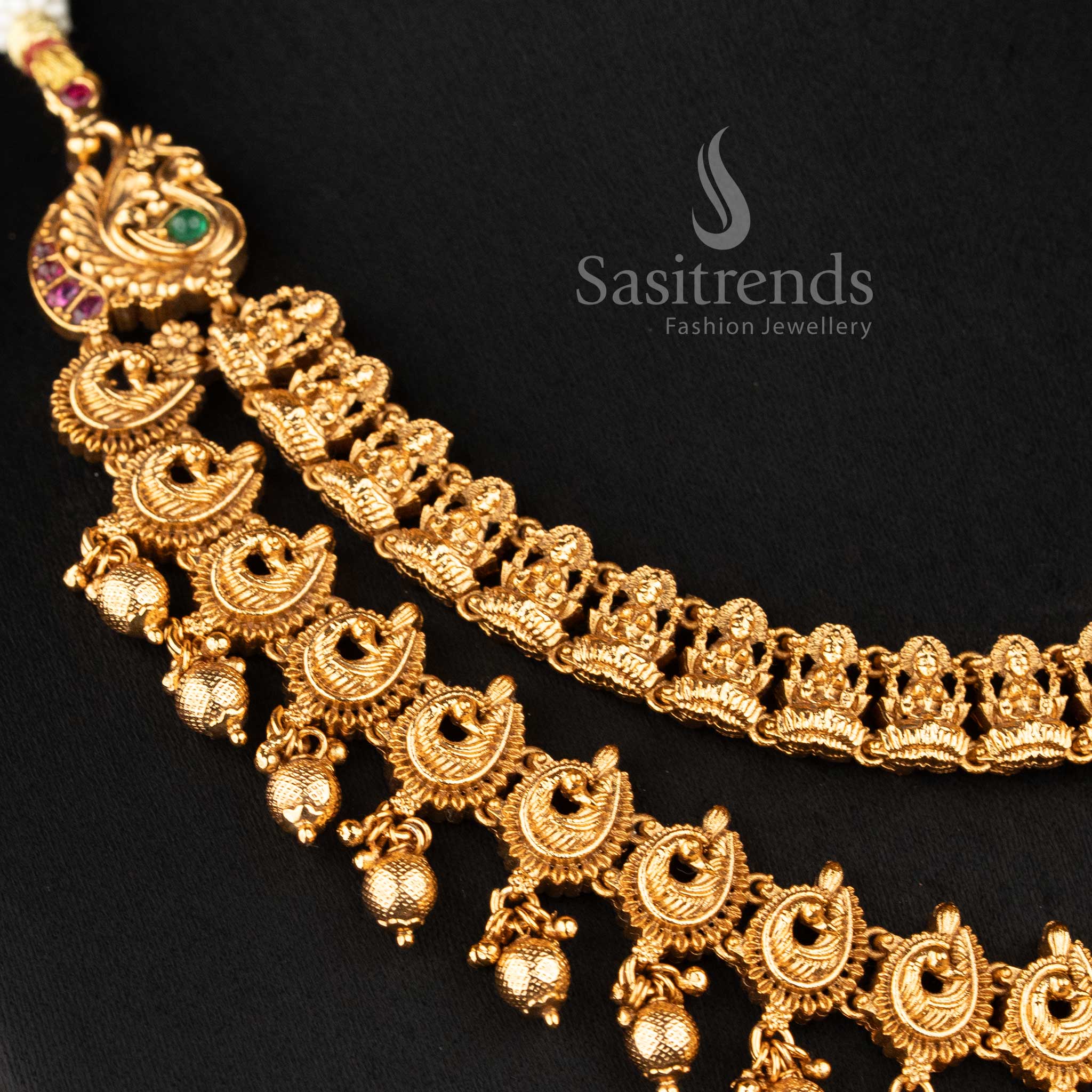 Close-up of the majestic circular pendant showing intricate peacock engravings and a seated Lakshmi deity in an antique matte gold finish 2073A - Sasitrends