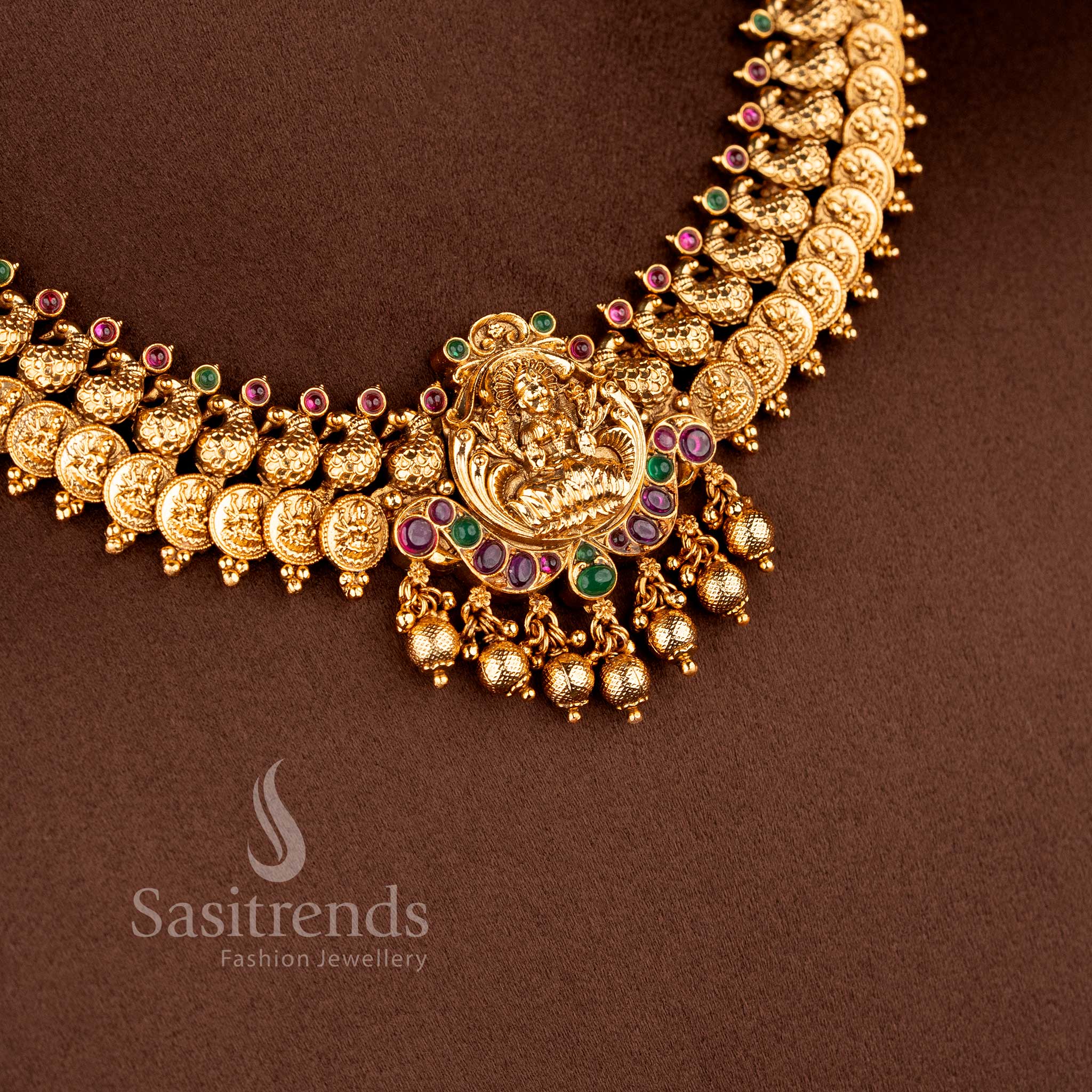 Matching peacock-stud jhumkas in a matte gold finish with bell-shaped domes and a classic South Indian temple aesthetic 2073B - Sasitrends