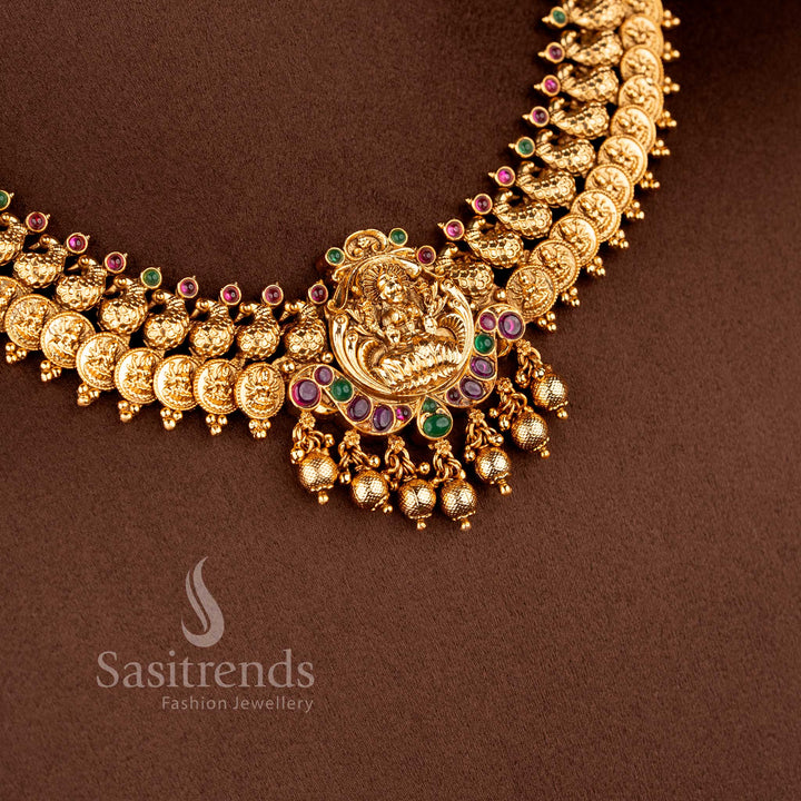 Matching peacock-stud jhumkas in a matte gold finish with bell-shaped domes and a classic South Indian temple aesthetic 2073B - Sasitrends