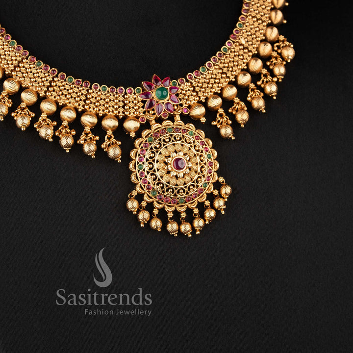 Traditional temple matte gold plated bridal floral necklace set with ruby stones and matching jhumka earrings for wedding wear sasitrends 