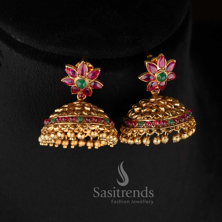 Traditional temple matte gold plated bridal floral necklace set with ruby stones and matching jhumka earrings for wedding wear sasitrends