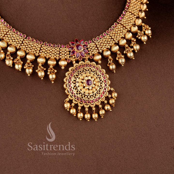 Ethnic matte finish temple jewellery set with ruby green stones central pendant and traditional design for bridal look sasitrends