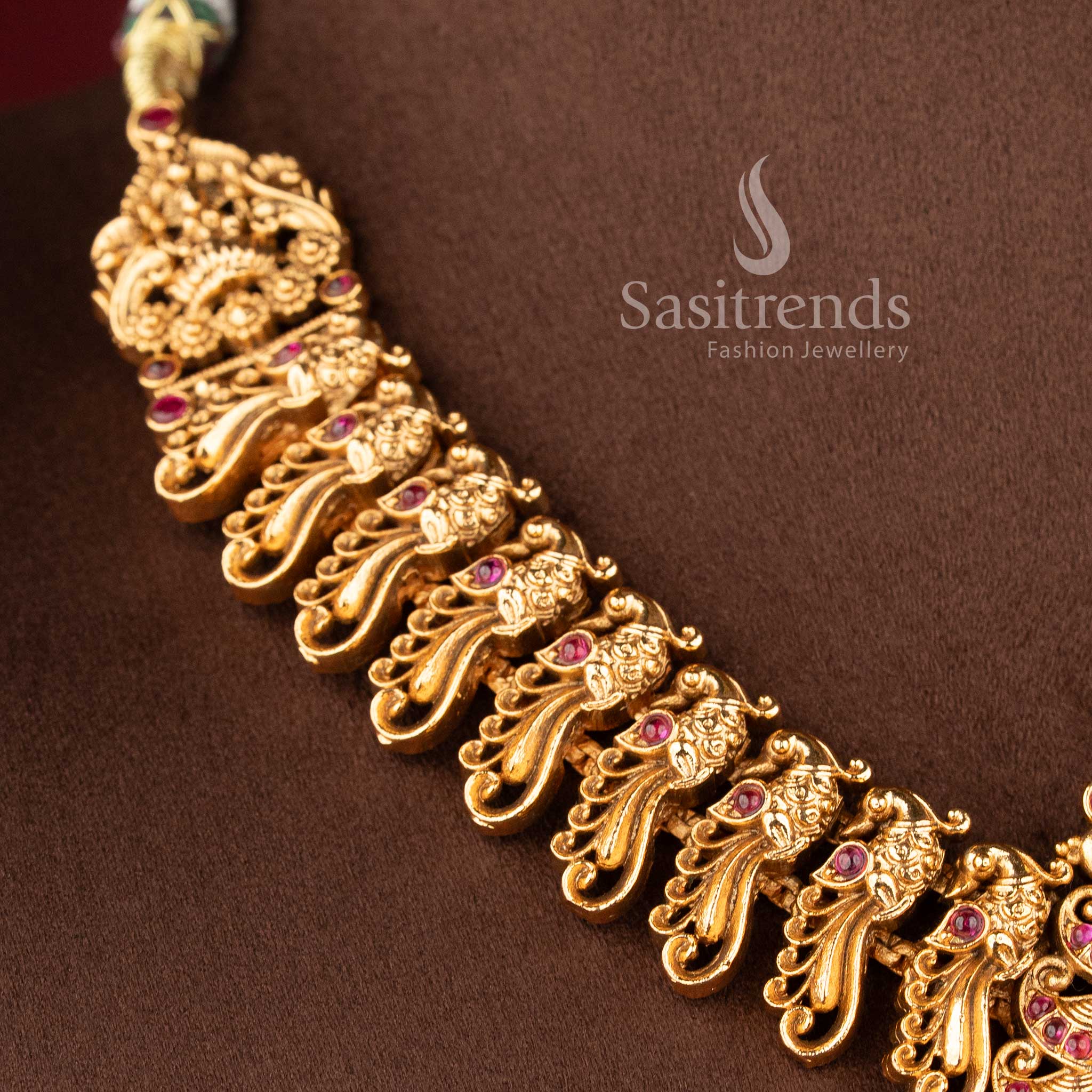 ethnic matte finish temple jewellery set with ruby stones lakshmi pendant and traditional jhumkas for wedding wear sasitrends