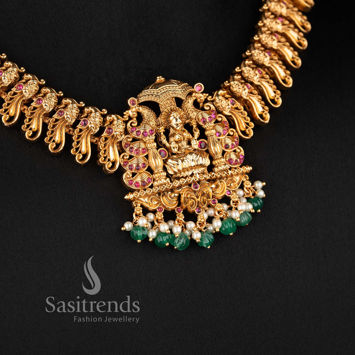 grand south indian bridal necklace with lakshmi and peacock motifs ruby green stone combination and bead hangings sasitrends