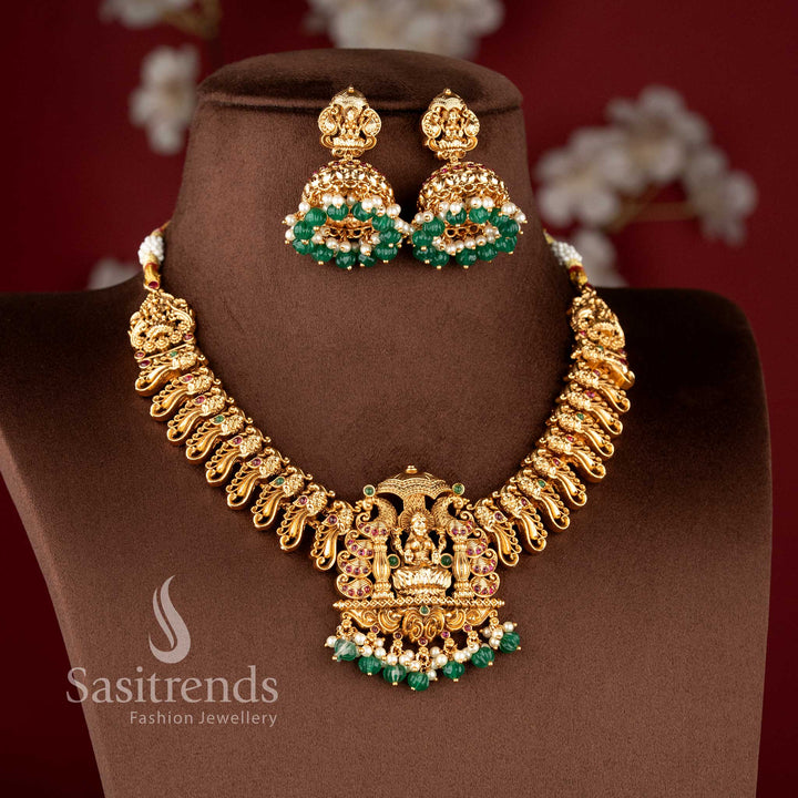 Grand south indian bridal necklace with lakshmi and peacock motifs ruby green stone combination and bead hangings sasitrends