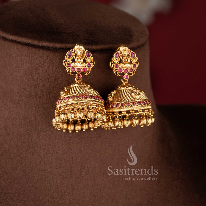 heavy bridal necklace set with temple design ruby stones central pendant and bead hangings sasitrends