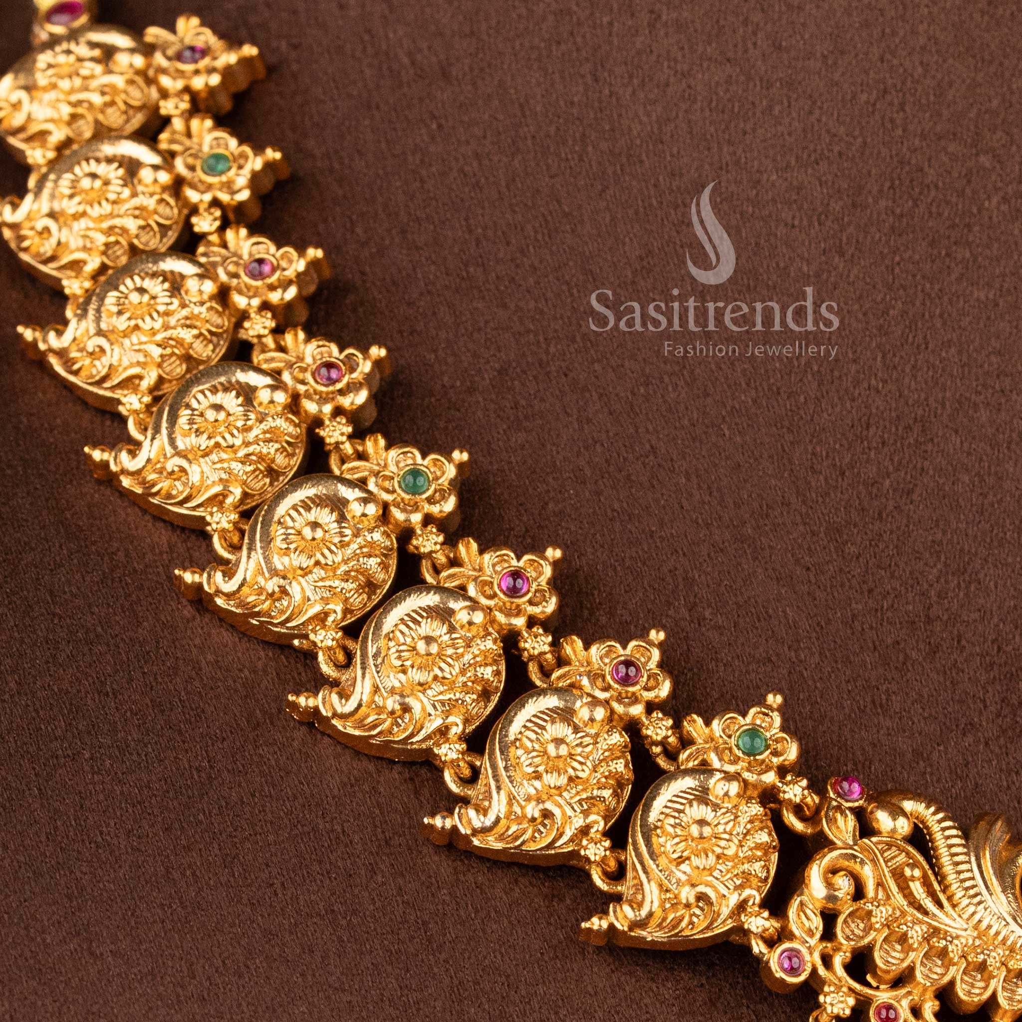 temple matte gold plated lakshmi peacock bridal necklace set with ruby and green stones and grand pendant for wedding wear sasitrends