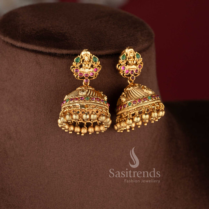 temple matte gold plated lakshmi peacock bridal necklace set with ruby and green stones and grand pendant for wedding wear sasitrends