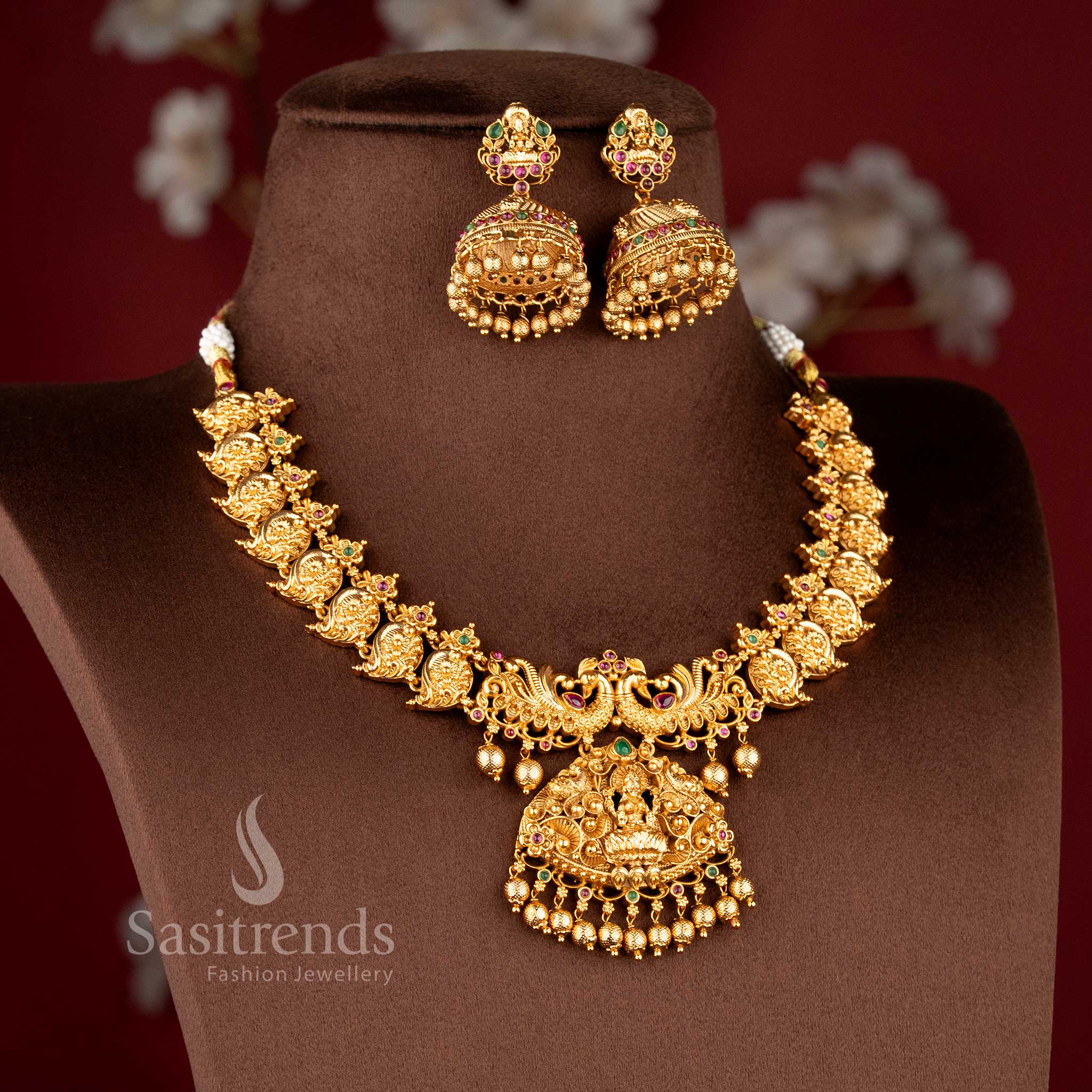 Traditional south indian jewellery set with lakshmi motif peacock design ruby green stone combination for bridal saree sasitrends