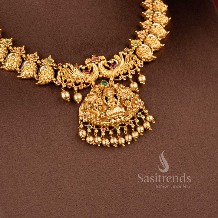 Traditional south indian jewellery set with lakshmi motif peacock design ruby green stone combination for bridal saree sasitrends