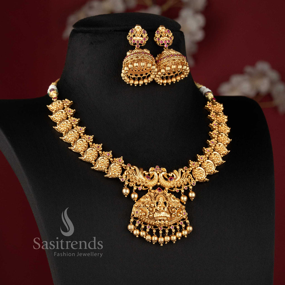 temple matte gold plated lakshmi peacock bridal necklace set with ruby stones and grand pendant for wedding wear sasitrends