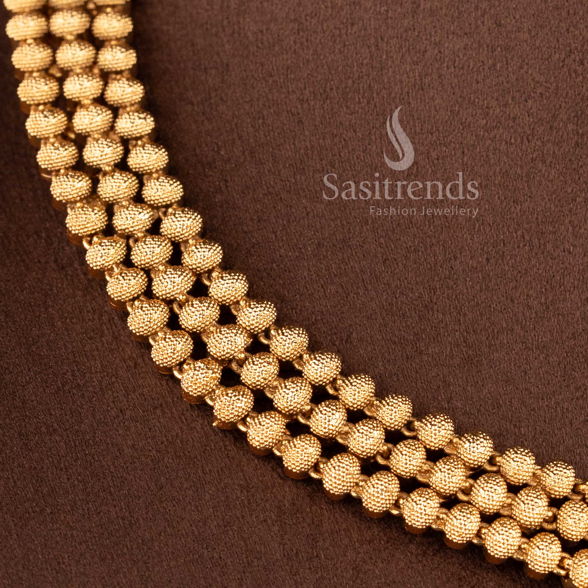 Bridal temple jewellery set with lakshmi pendant and gold beads chain for wedding look sasitrends