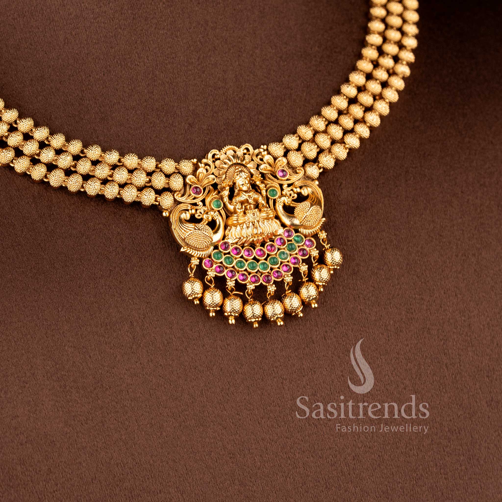 Lakshmi temple jewellery set with layered gold beads necklace for bridal wedding and festive wear sasitrends