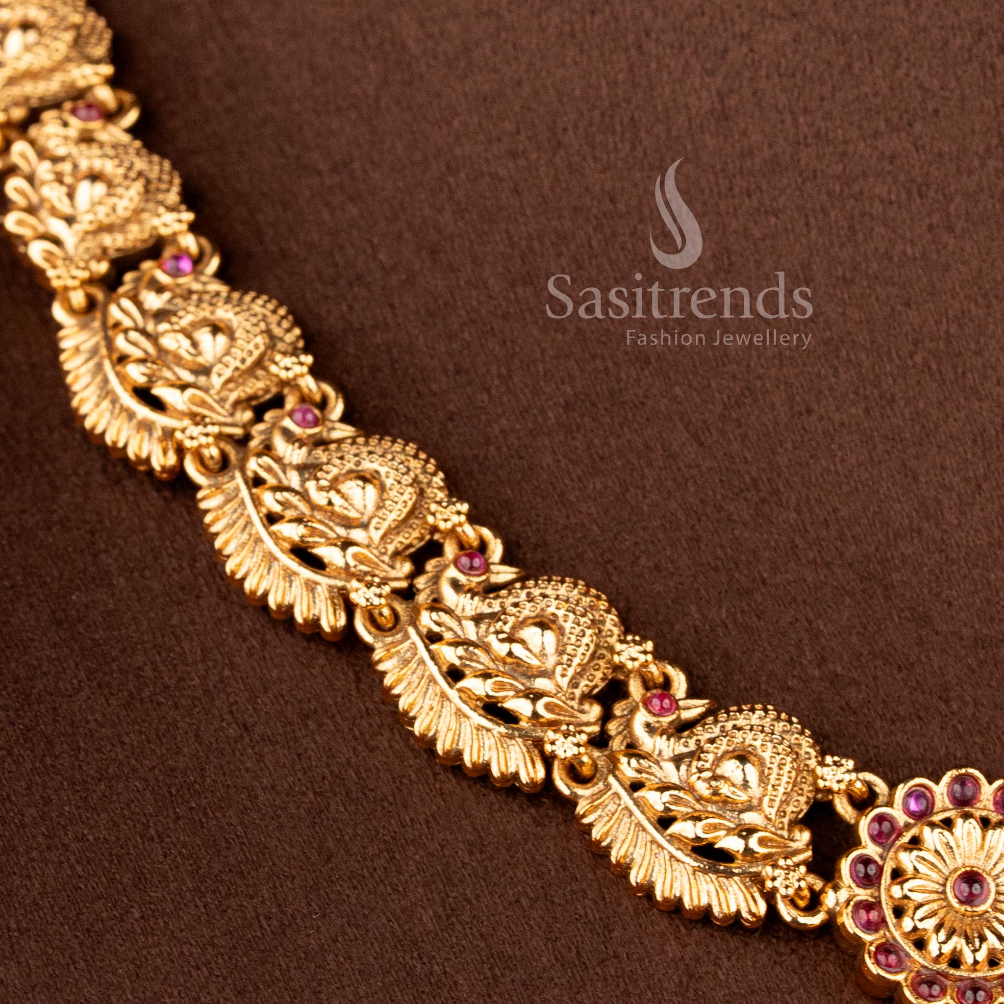Close-up of the Bridal Jewellery Set showing the intricate matte gold finish and ruby kemp stone accents, ideal for temple jewellery for marriage styling - Sasitrends