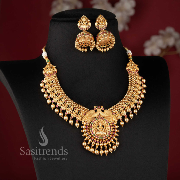 Traditional Lakshmi-stud jhumkas with bell domes and bead clusters from the temple jewellery for marriage collection - Sasitrends