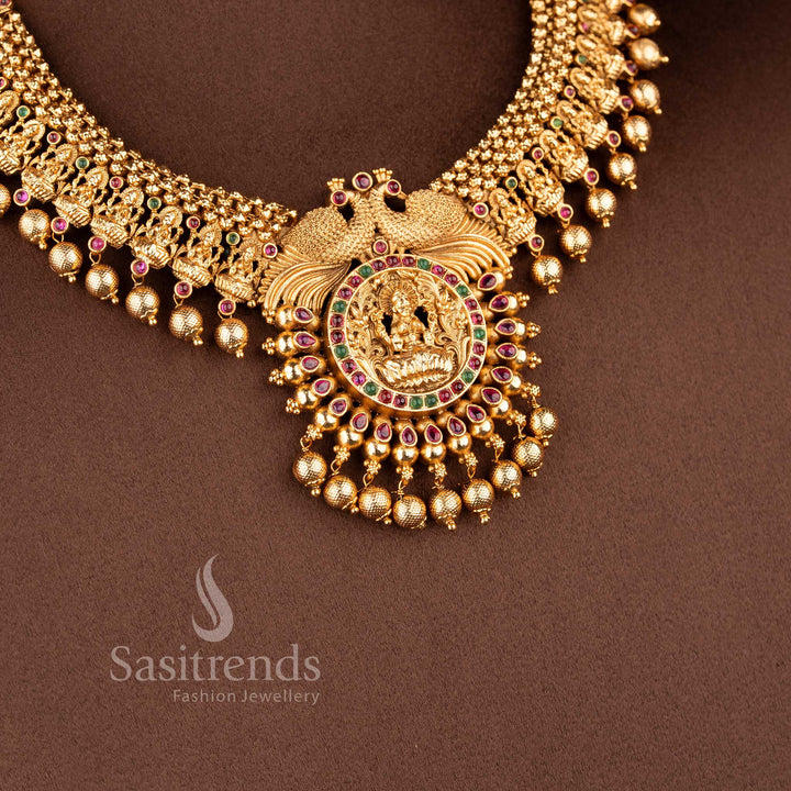 Grand Temple Jewellery Set for wedding wear featuring a twin peacock and Goddess Lakshmi circular choker pendant - Sasitrends