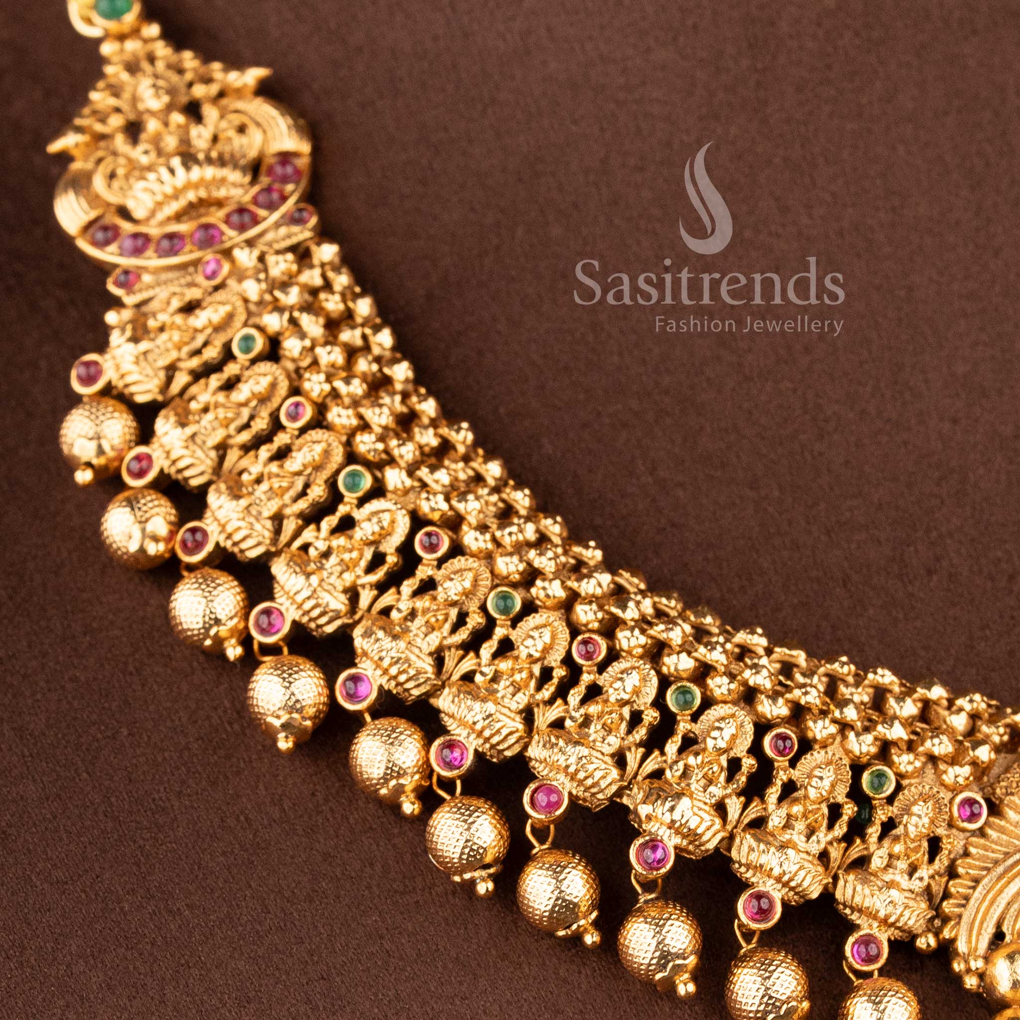 Grand Temple Jewellery Set for wedding wear featuring a twin peacock and Goddess Lakshmi circular choker pendant - Sasitrends