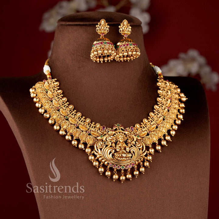 Traditional deity-stud jhumkas with stone-accented domes and gold bead clusters from the temple jewellery for wedding collection - Sasitrends