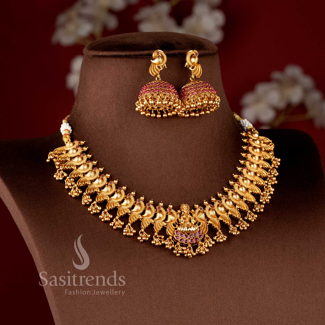 Grand Temple Jewellery Set for brides featuring a seated Lakshmi pendant on a lotus base and dancing peacock-motif links - Sasitrends