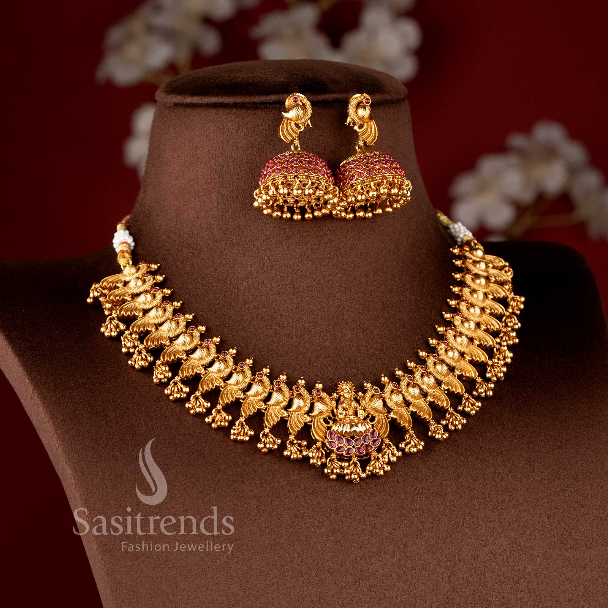 Grand Temple Jewellery Set for brides featuring a seated Lakshmi pendant on a lotus base and dancing peacock-motif links - Sasitrends