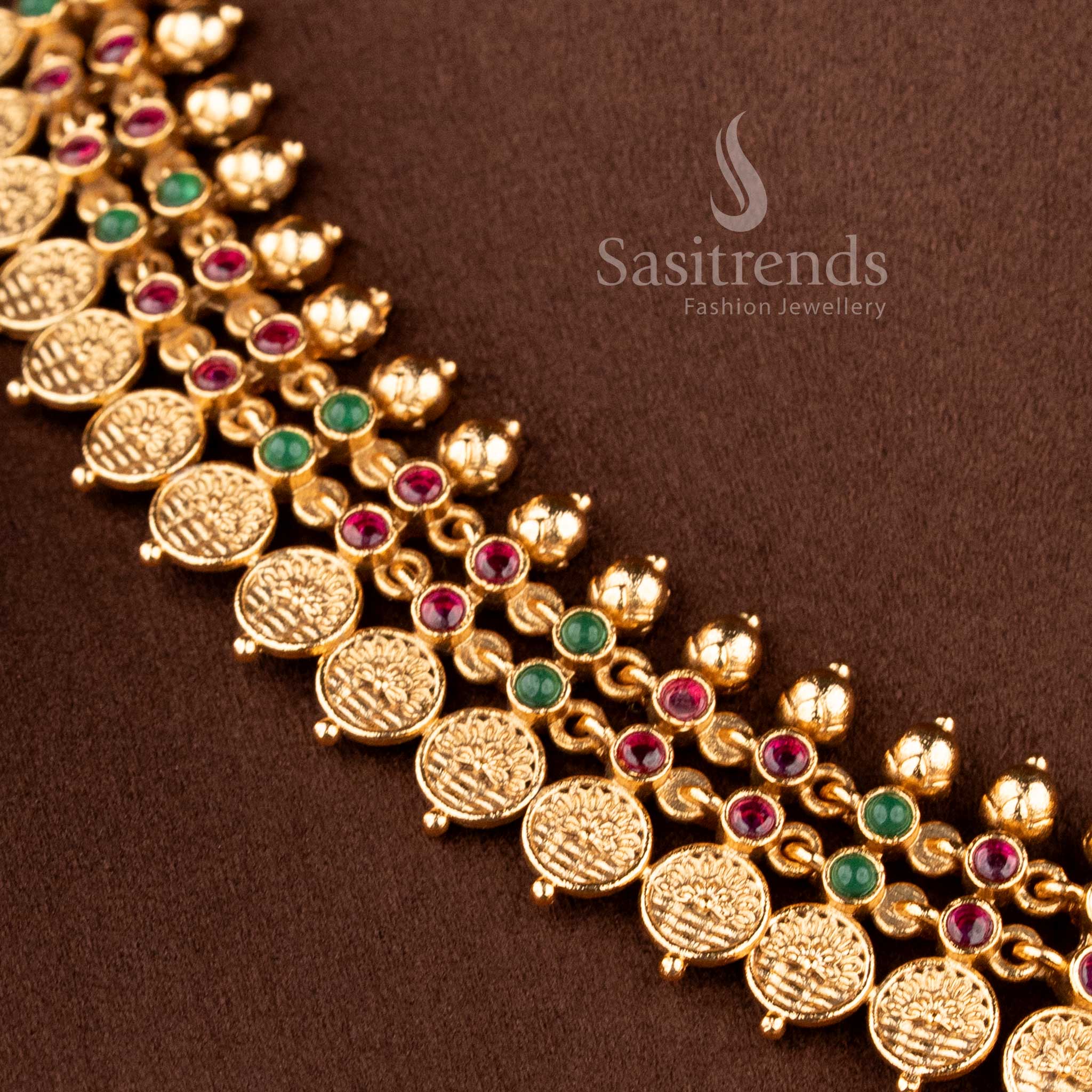 Close-up of the Bridal Jewellery Set showing the leaf-patterned border and embossed coin motifs in a premium matte gold finish - Sasitrends