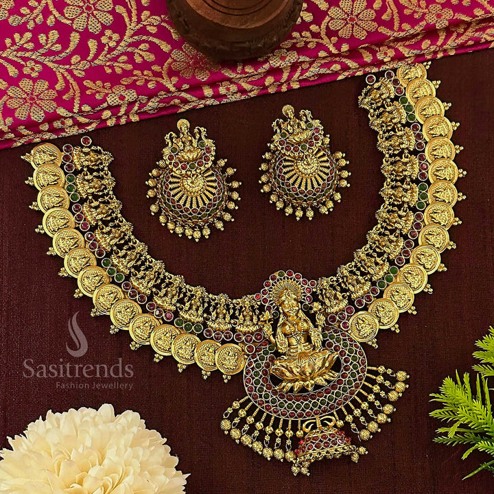 Ethnic temple-style bridal choker set in matte gold, featuring Lakshmi coin pendants and twin-tone ruby-green embellishments for a vintage-inspired hallmark jewellery look – sasitrends