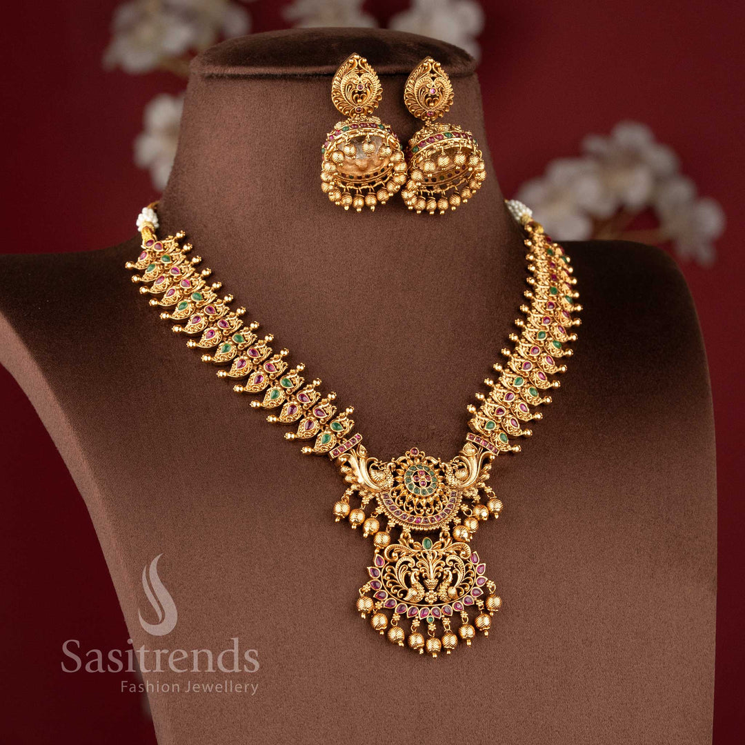 Grand Temple Jewellery Set for wedding wear featuring a multi-tiered twin peacock pendant and peacock-motif links - Sasitrends