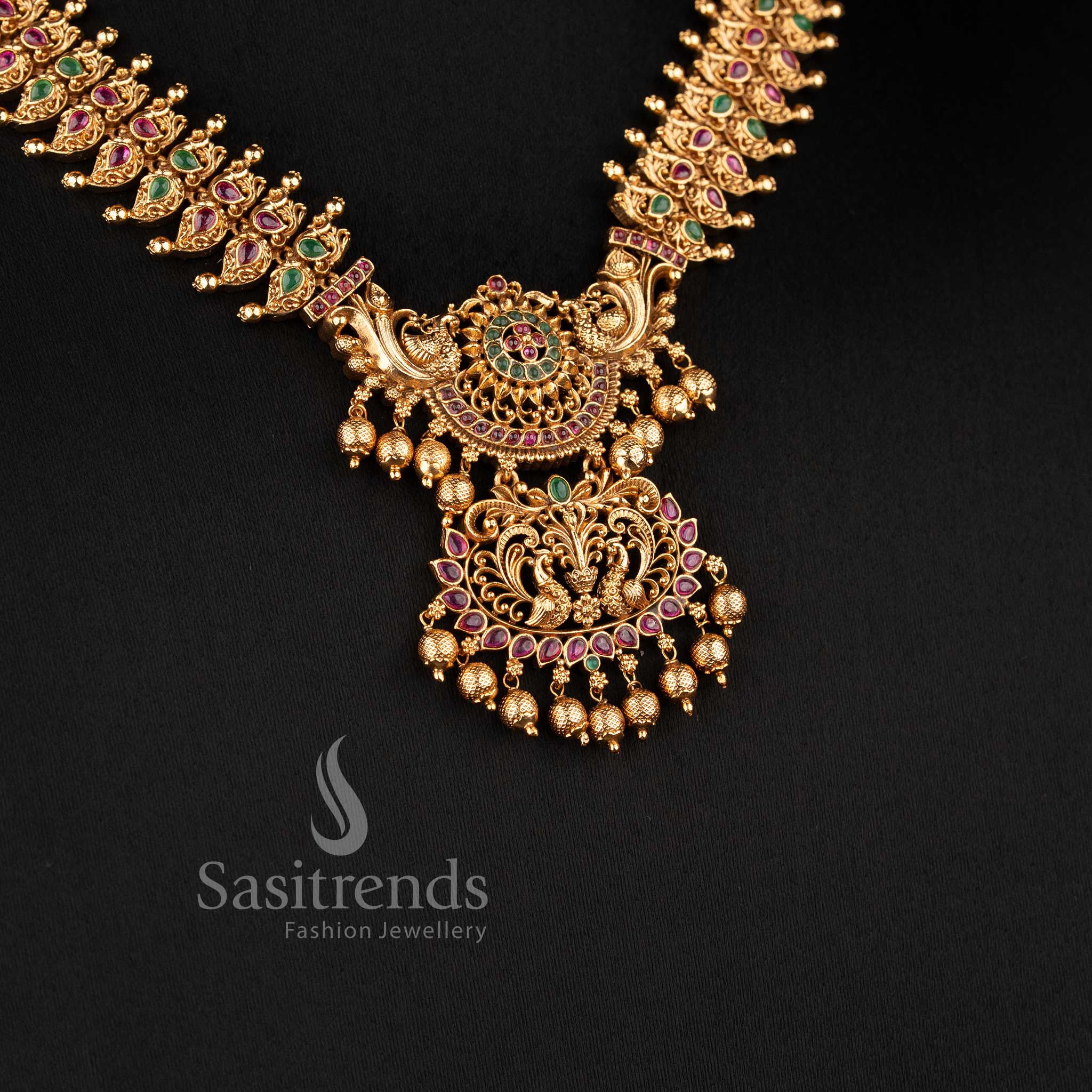 Traditional peacock-stud jhumkas with stone-accented domes and gold bead drops from the temple jewellery for marriage collection - Sasitrends