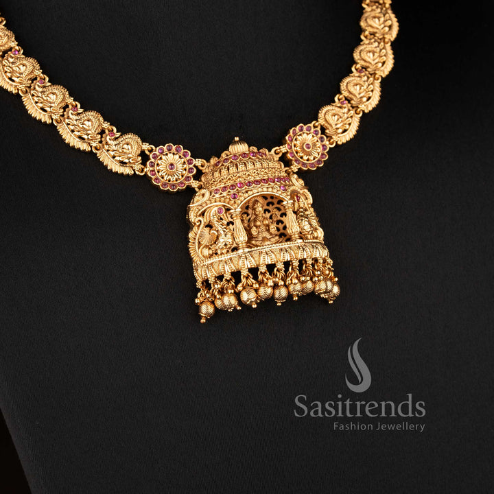 Elegant temple jewellery set in ruby color with Lakshmi peacock Nakshi carved choker necklace in matte gold finish for bridal look - Sasitrends