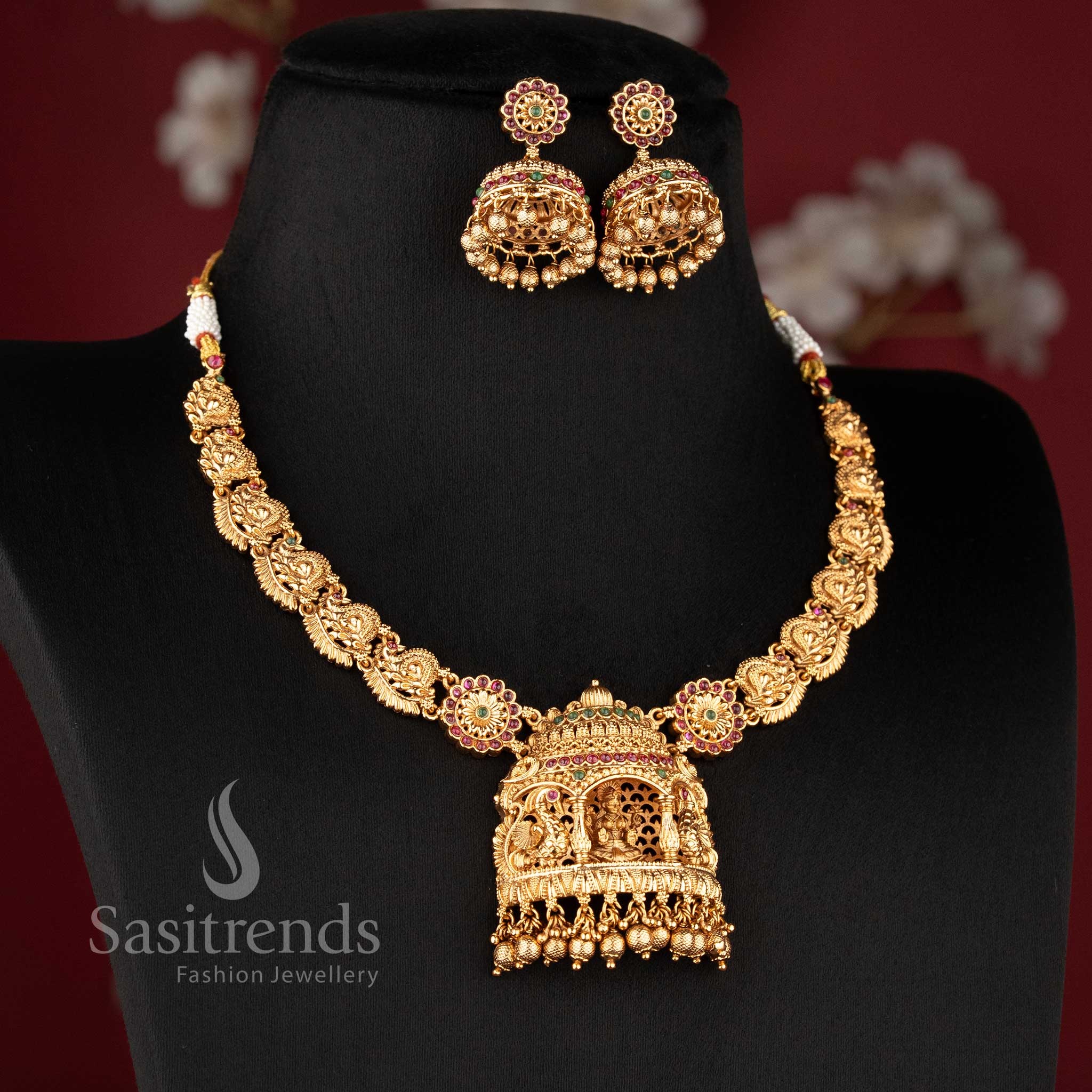 Elegant temple jewellery set in ruby green color with Lakshmi peacock Nakshi carved choker necklace in matte gold finish for bridal look - Sasitrends