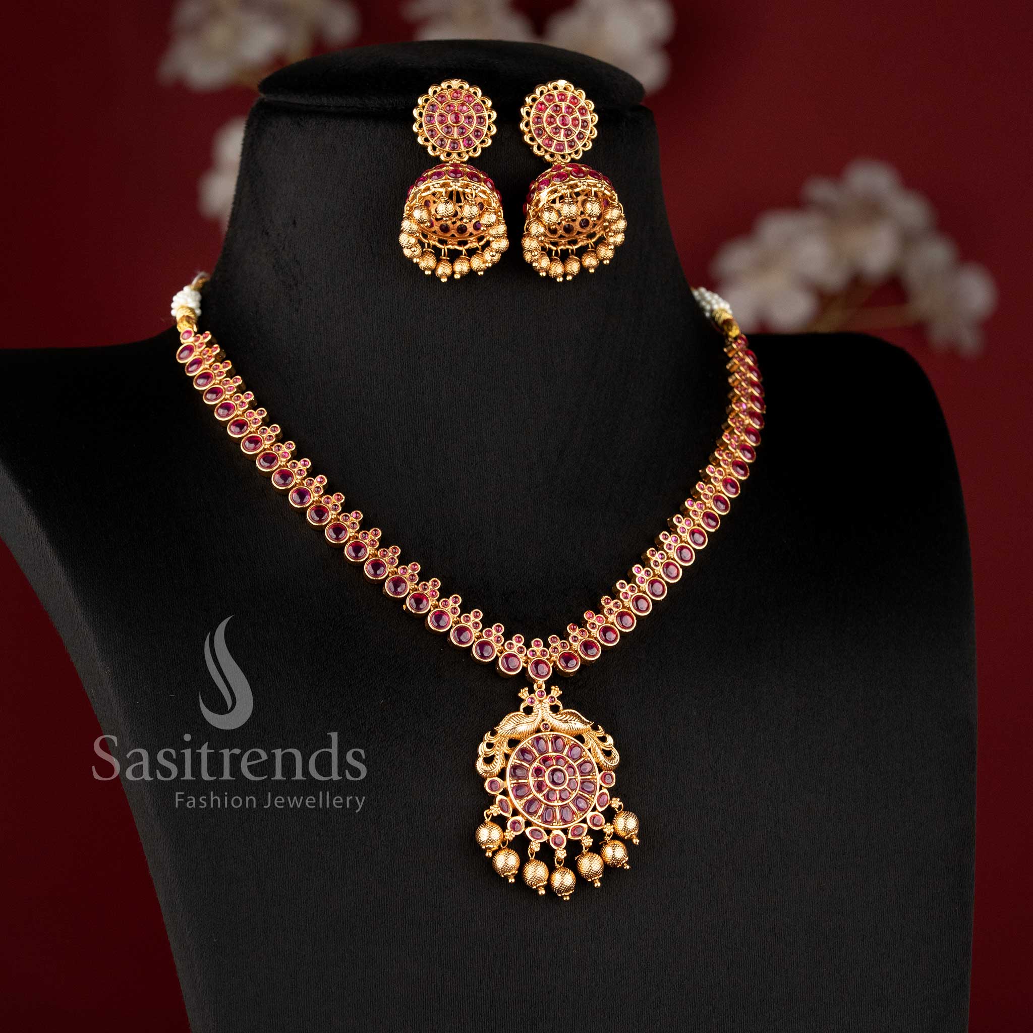 Grand bridal wear temple matte gold finish ruby Kemp and peacock necklace jewellery set by Sasitrends, perfect for wedding and festive occasions