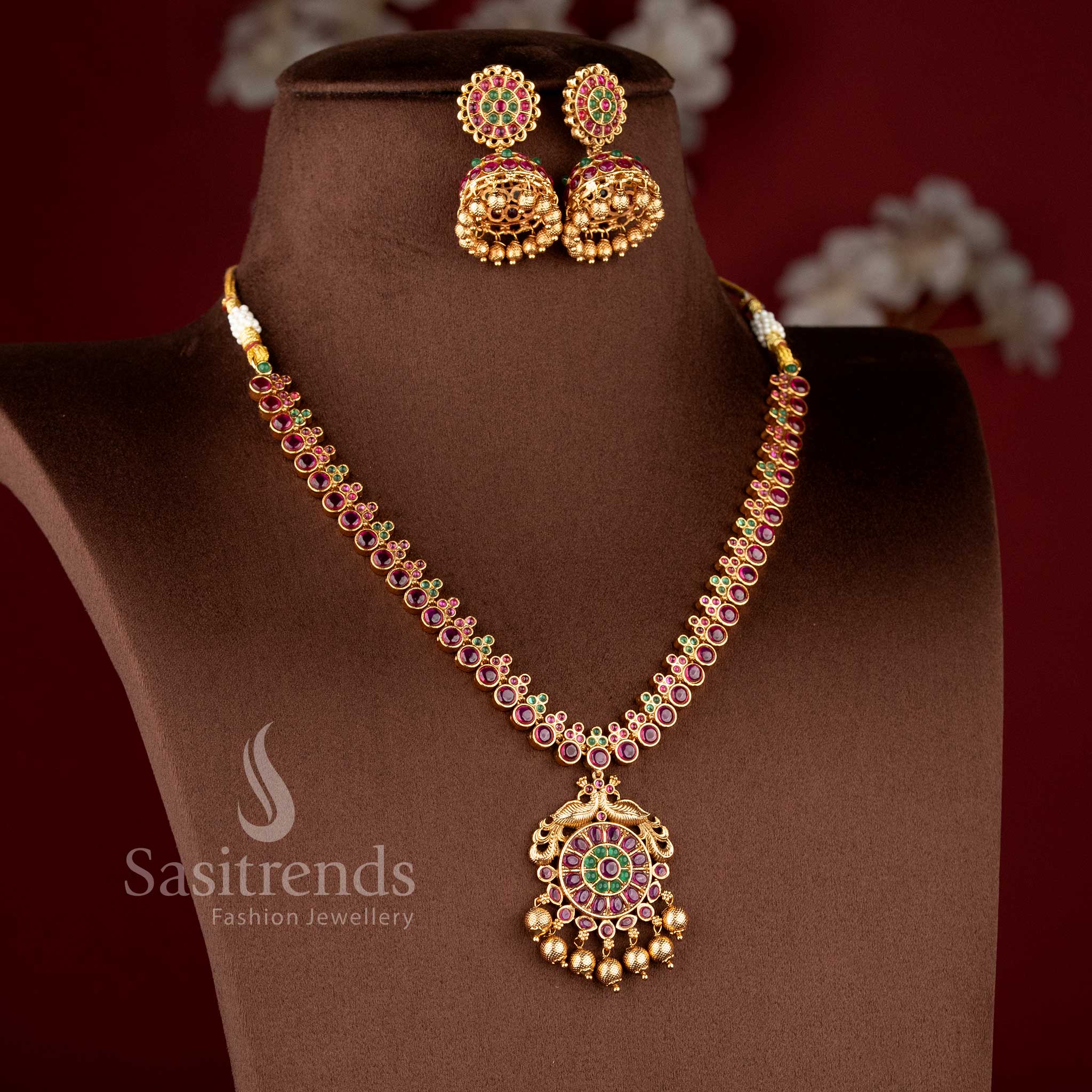 Grand bridal wear temple matte gold finish ruby green Kemp and peacock necklace jewellery set by Sasitrends, perfect for wedding and festive occasions