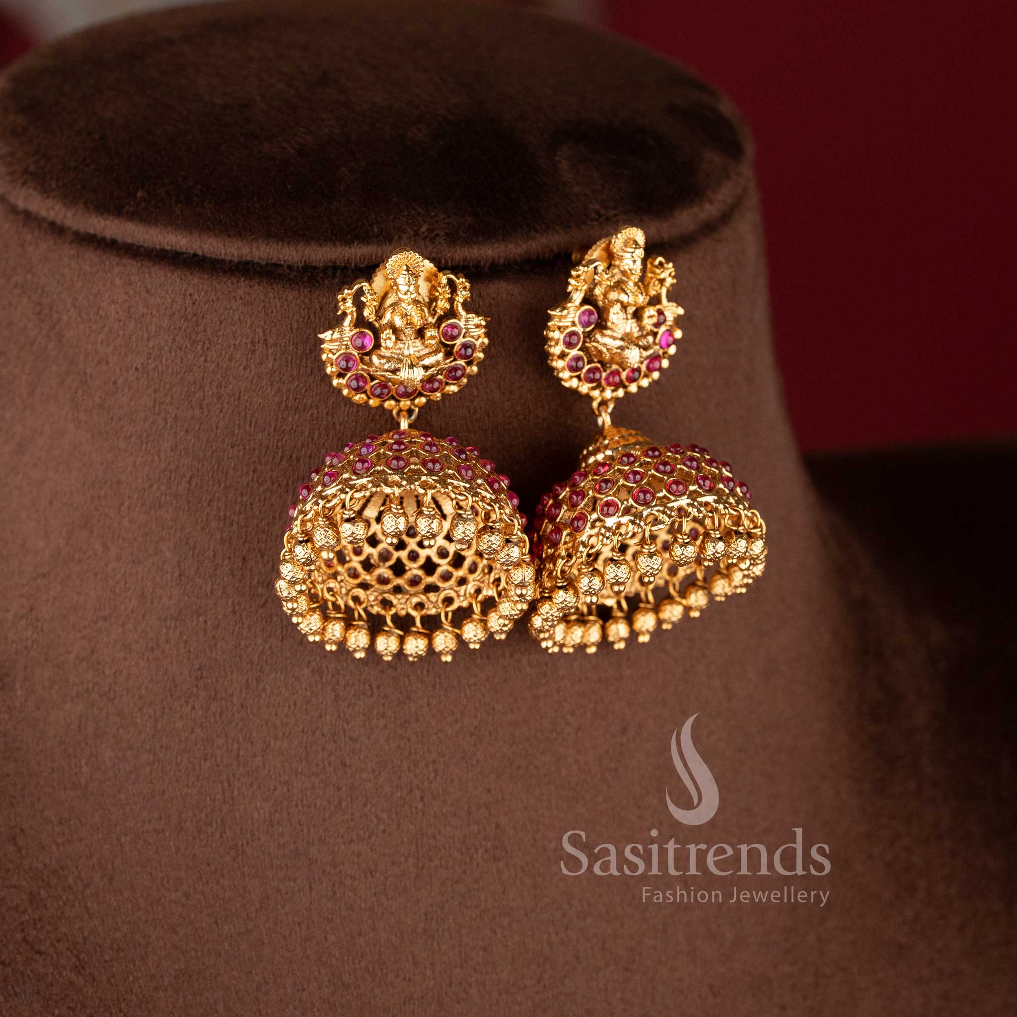 Traditional temple jewellery necklace set with Lakshmi lotus and kasu design in ruby color and matte gold tone by Sasitrends for bridal wear