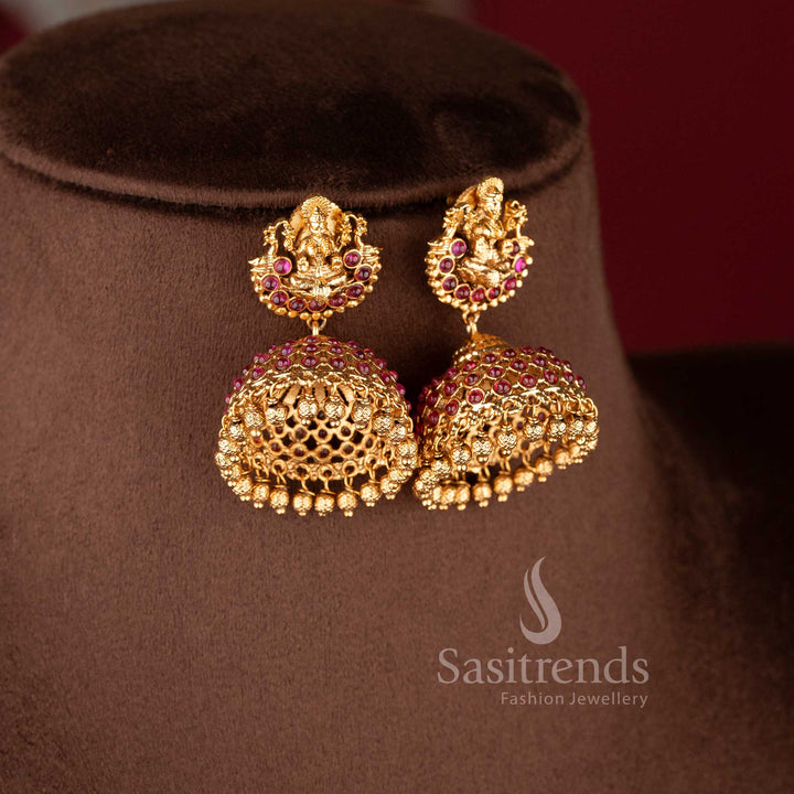 Traditional temple jewellery necklace set with Lakshmi lotus and kasu design in ruby color and matte gold tone by Sasitrends for bridal wear