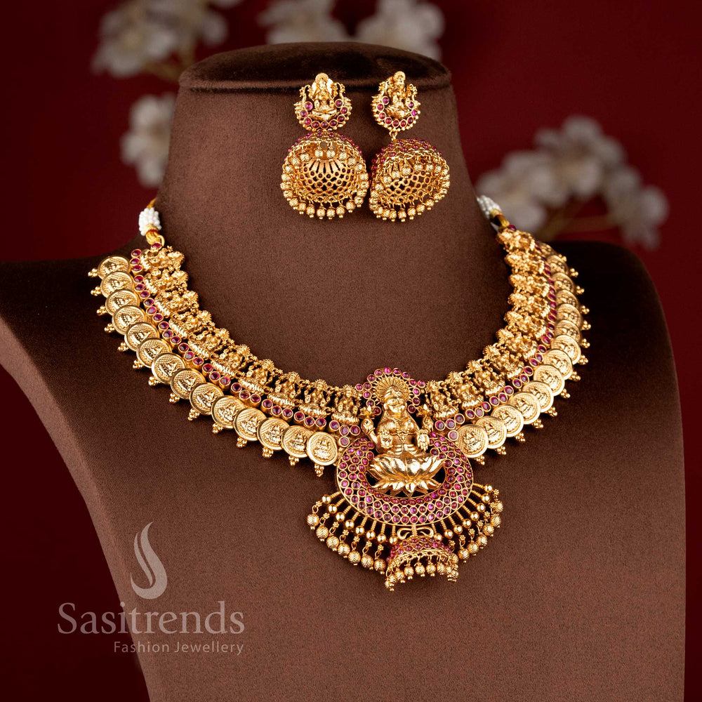 Elegant South Indian bridal temple jewellery set featuring Lakshmi lotus kasu necklace in matte gold finish with ruby stones by Sasitrends