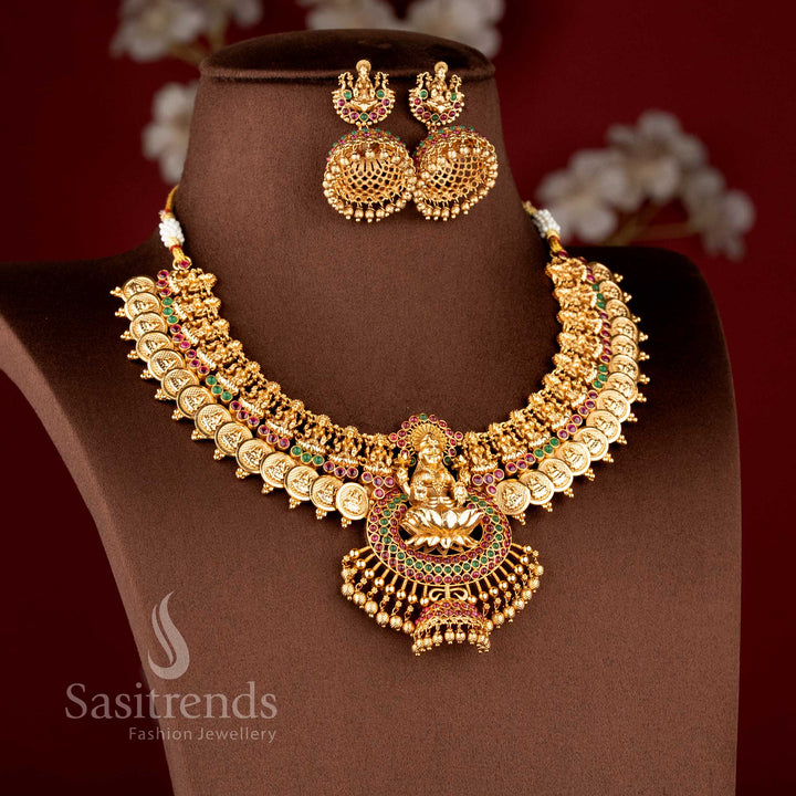 Grand bridal temple jewellery set featuring Lakshmi lotus kasu necklace in ruby green finish by Sasitrends, perfect for festive and traditional occasions