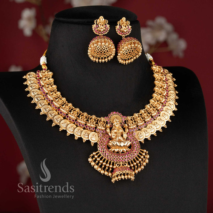 Grand bridal wear temple matte gold finish Lakshmi lotus and kasu necklace jewellery set in ruby color by Sasitrends, perfect for wedding and festive occasions