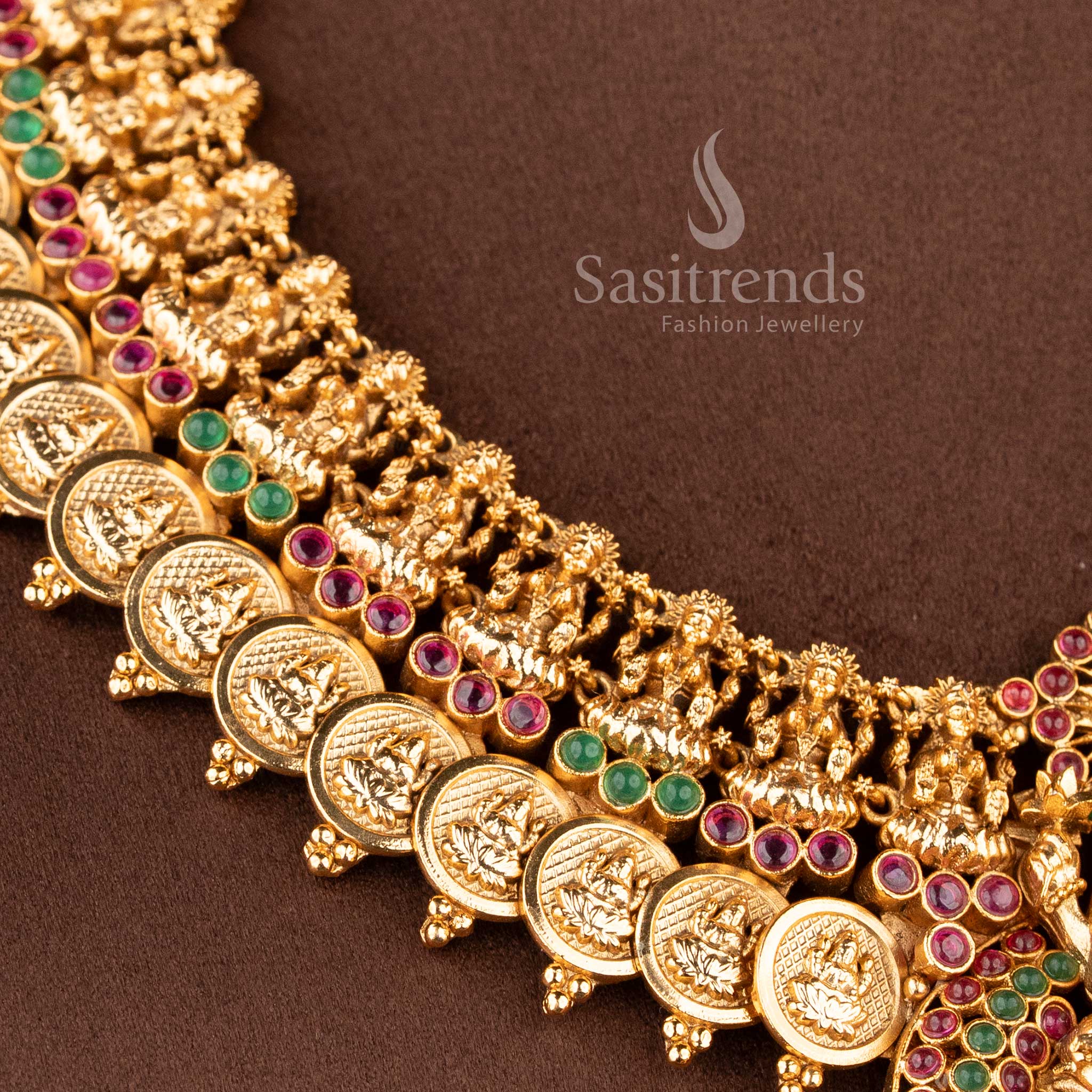 Grand bridal temple jewellery set featuring Lakshmi lotus kasu necklace in ruby green finish by Sasitrends, perfect for festive and traditional occasions