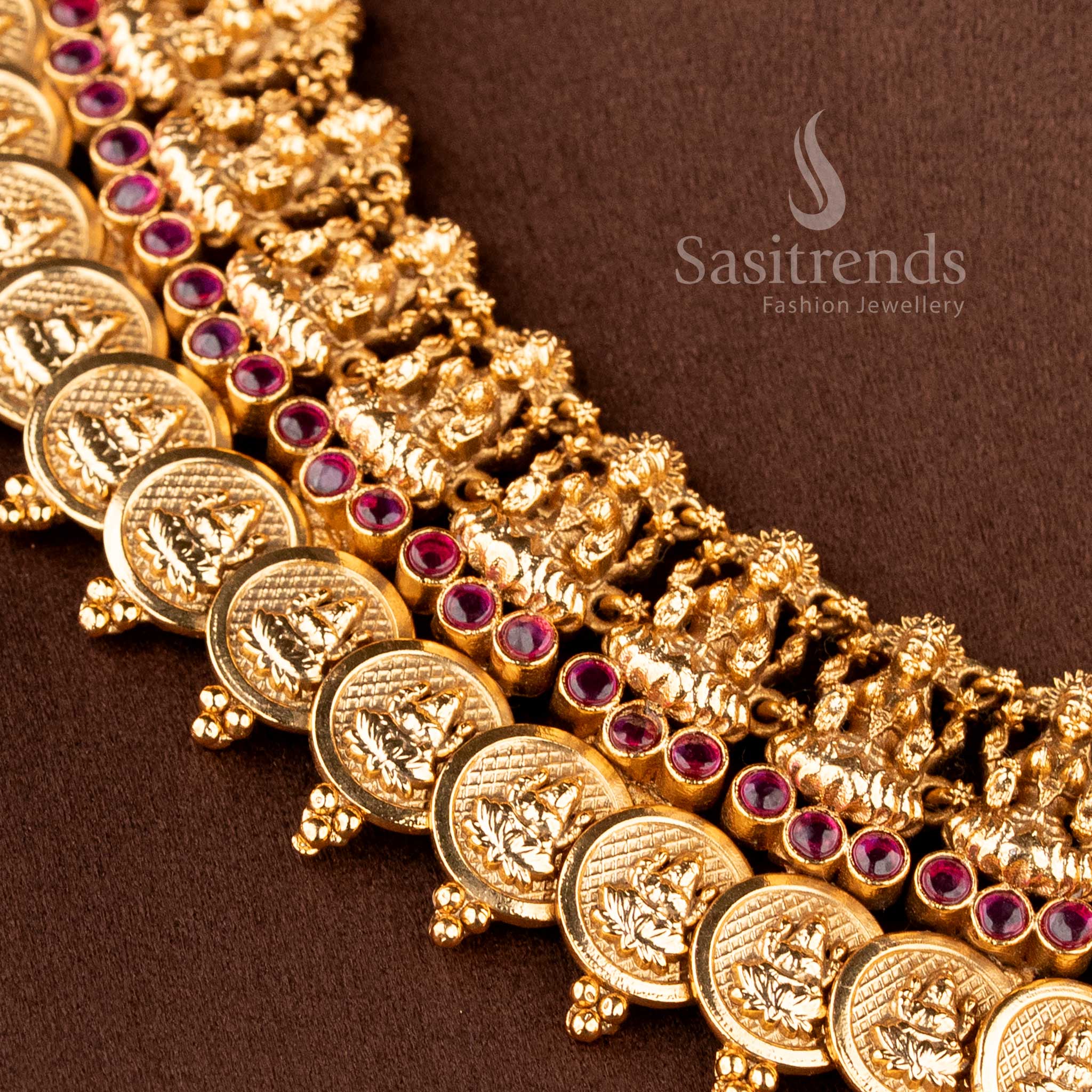 Grand bridal temple jewellery set featuring Lakshmi lotus kasu necklace in ruby green finish by Sasitrends, perfect for festive and traditional occasions