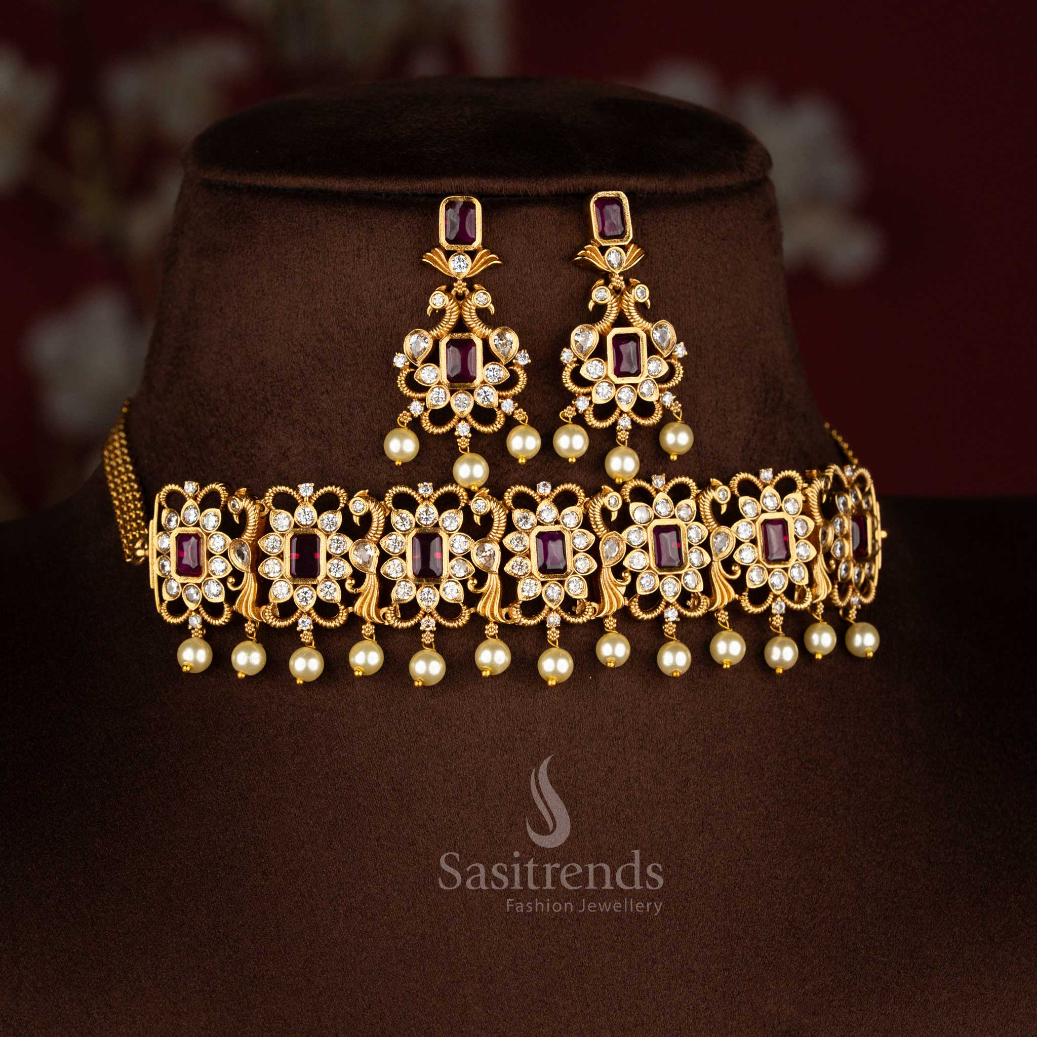 Elegant ruby temple choker AD Stones jewellery set adorned with a graceful peacock motif, designer matte gold finish – Sasitrends