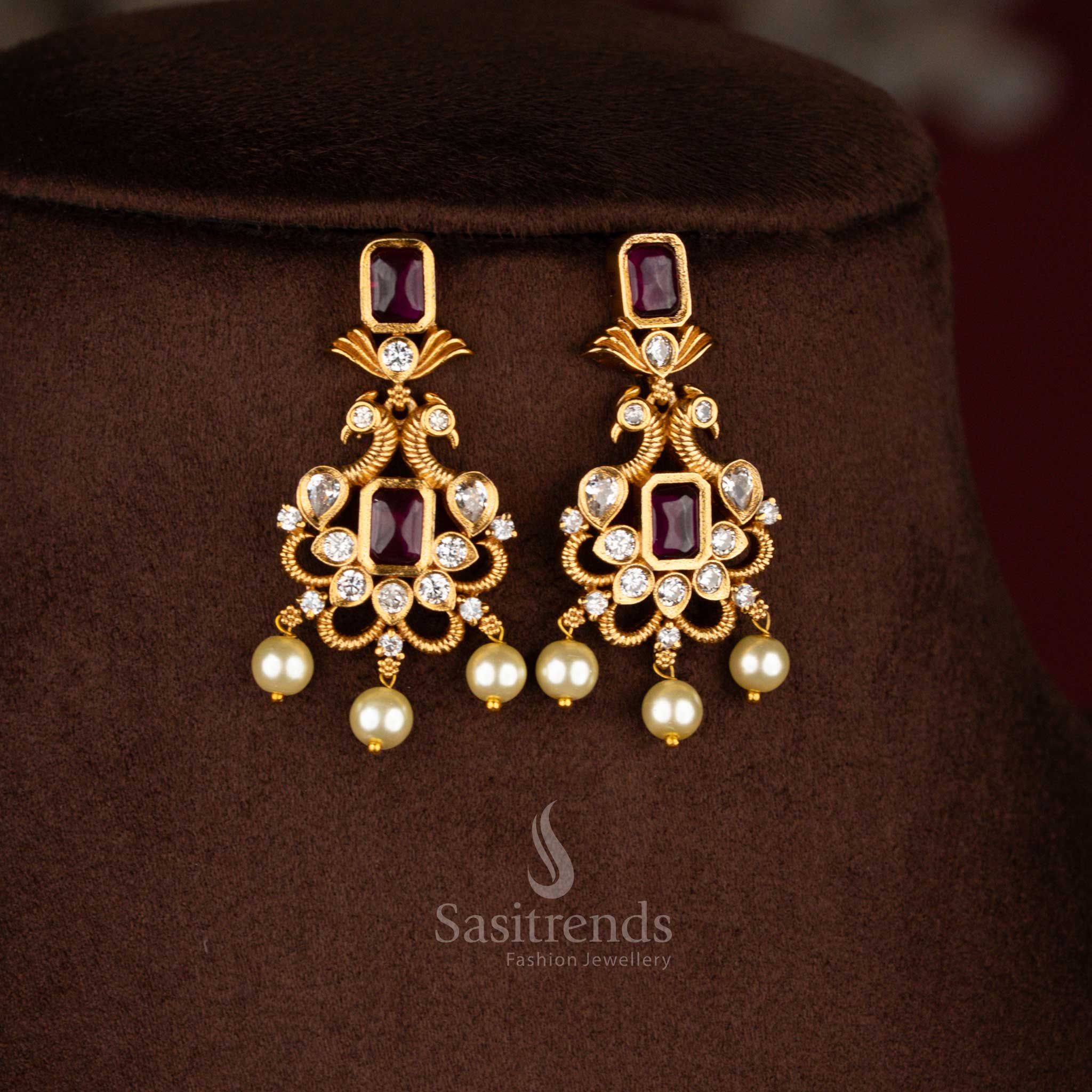 Gorgeous ruby temple choker AD Stones jewellery set adorned with a graceful peacock motif, designer matte gold finish – Sasitrends